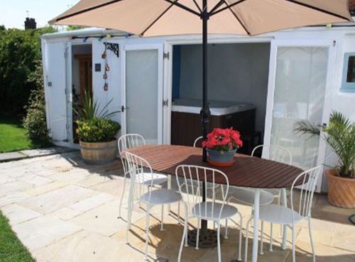 Relax in our garden, or enjoy the spa.